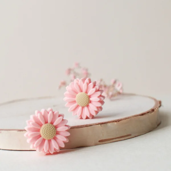 Embout aiguilles marguerite rose pastel
